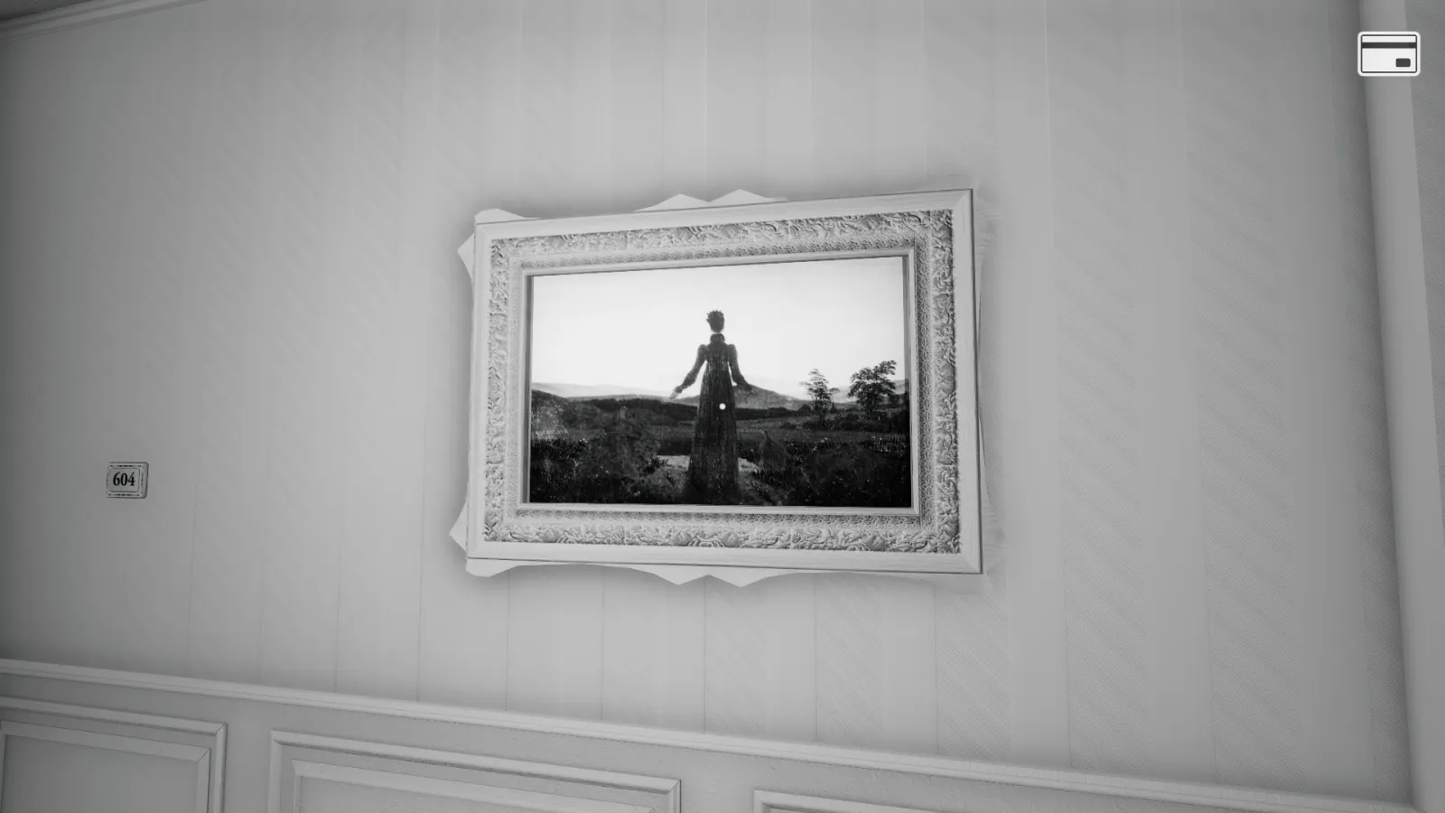 Capture d'écran du jeu The Shattering. L'image est en noir et blanc, et montre un tableau du peinture Friedrich accrochée au mur.