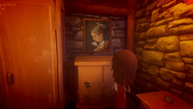 Image du jeu Last Day of June dans laquelle on voit un personnage féminin face à un mur de pierres apparantes, auquel est accorché un tableau reprenant la composition de la "Liseuse" de Fragonard