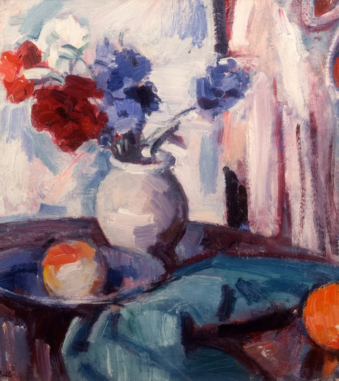 Bouquet d'œillets et de bleuets dans un vase